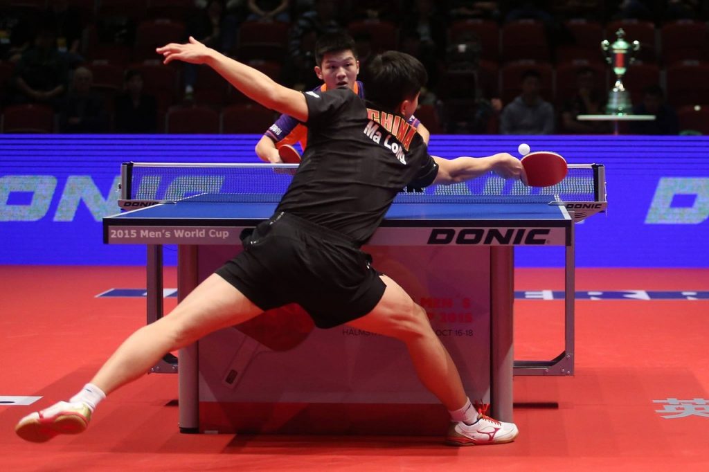 Table Tennis Players Playing according to Rules