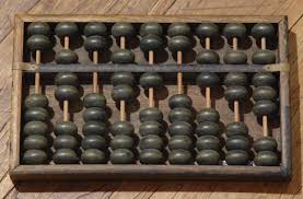 A picture is showing an abacus which is considered as the first computer in the history of computer.