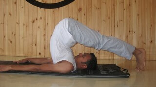 yoga for back pain- Halasana (Plow Pose)