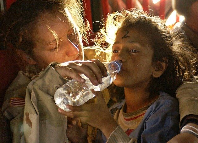 one of my very first tips for be healthy that is drink of plenty of water , so that this in this image a mother give much water to her daughter to drink