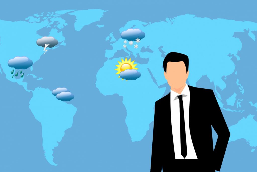 Picture shows a man giving news about weather in different parts of world