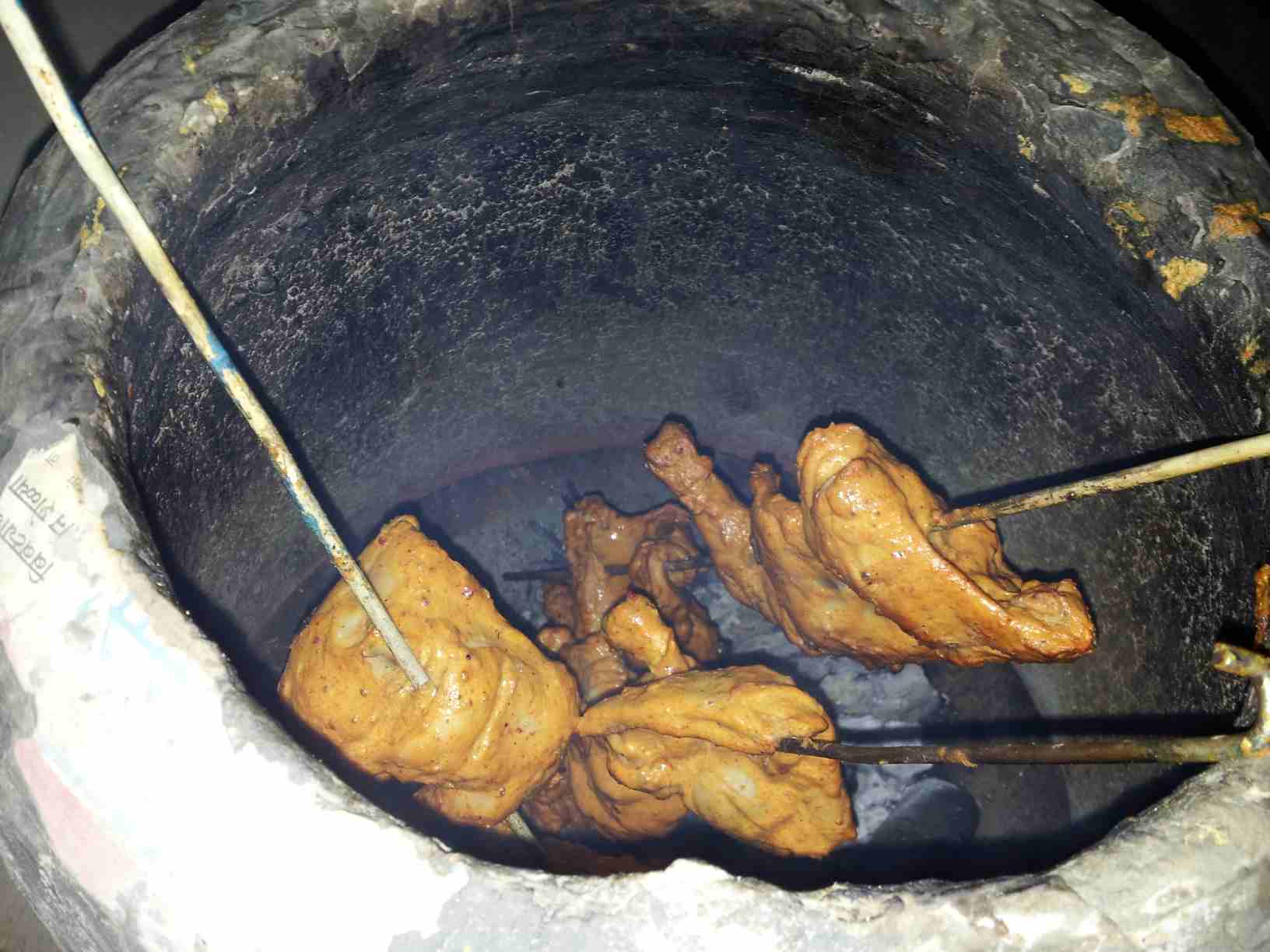 Grilling Tandoori Chicken in Tandoor Oven 