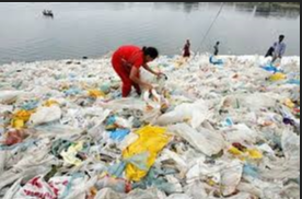heap of plastic waste near ocean