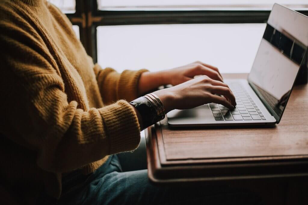 Image of a woman working on laptop