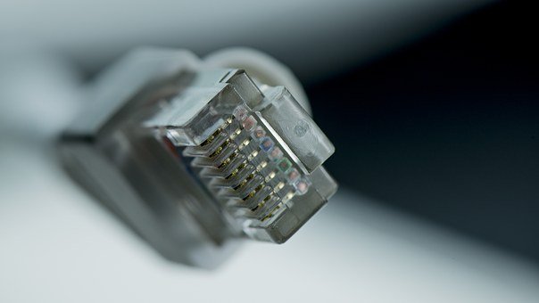 ethernet cable connected to modem for broadband internet